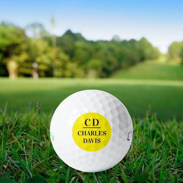 Yellow black monogram initials name golf balls (Creator Uploaded)