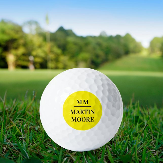 Yellow black monogram initials name golf balls (Creator Uploaded)