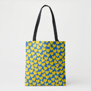 Yellow blue hearts background tote bag