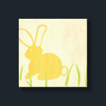 Yellow Bunny and Green Grass by Chariklia Zarris Canvas Print<br><div class="desc">Blades of green grass poke up from the ground,  surrounding a yellow bunny in this piece by Chariklia Zarris. A great print to place in a child's nursery,  or to give as a gift to someone who loves rabbits!</div>