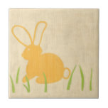 Yellow Bunny and Green Grass by Chariklia Zarris Tile<br><div class="desc">Blades of green grass poke up from the ground,  surrounding a yellow bunny in this piece by Chariklia Zarris. A great print to place in a child's nursery,  or to give as a gift to someone who loves rabbits!</div>