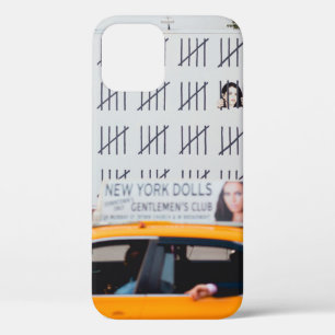 YELLOW CAB IN FRONT OF WHITE PAINTED WALL iPhone 12 CASE