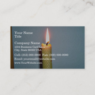 Yellow Candle flame against white wall Business Card