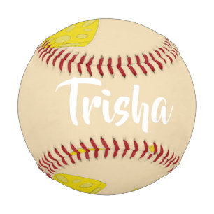 Yellow cheese shapes on pink baseball