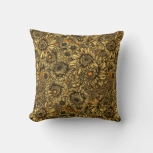 Yellow chrysanthemum flowers and orange beetles cushion