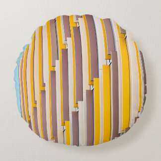 YELLOW CONCRETE BUILDING DURING DAYTIME ROUND CUSHION