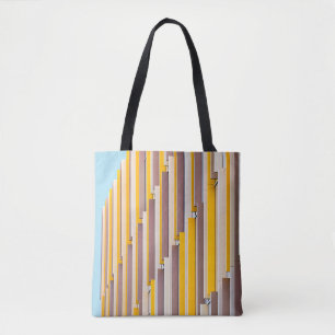 YELLOW CONCRETE BUILDING DURING DAYTIME TOTE BAG