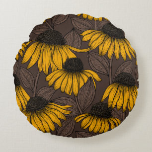 Yellow coneflowers on dark brown round cushion