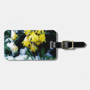 Yellow Daffodils flowers in the snow Luggage Tag