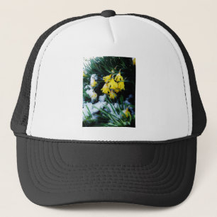 Yellow Daffodils flowers in the snow Trucker Hat