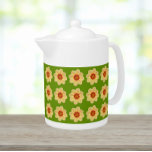Yellow Dahlia Floral Pattern on Green<br><div class="desc">White ceramic teapot with lid that features the photo image of a yellow Dahlia flower on a lime green background and printed in a repeating pattern. A fun,  floral design!</div>