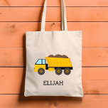 Yellow Dump Truck Kids Personalised Construction Tote Bag<br><div class="desc">This kids' tote bag features an illustration of a yellow dump truck. Personalise it with your child's name in black letters. Makes a great book bag!</div>