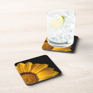 Yellow flower on black background coaster