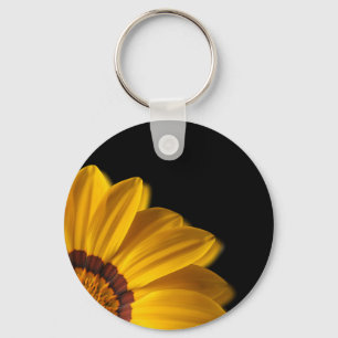 Yellow flower on black background key ring