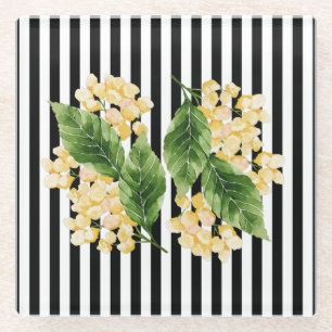 Yellow flowers on black and white stripes glass coaster