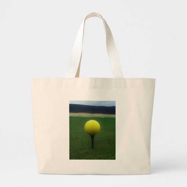 Yellow Golf Ball on a mountain golf course Large Tote Bag (Front)