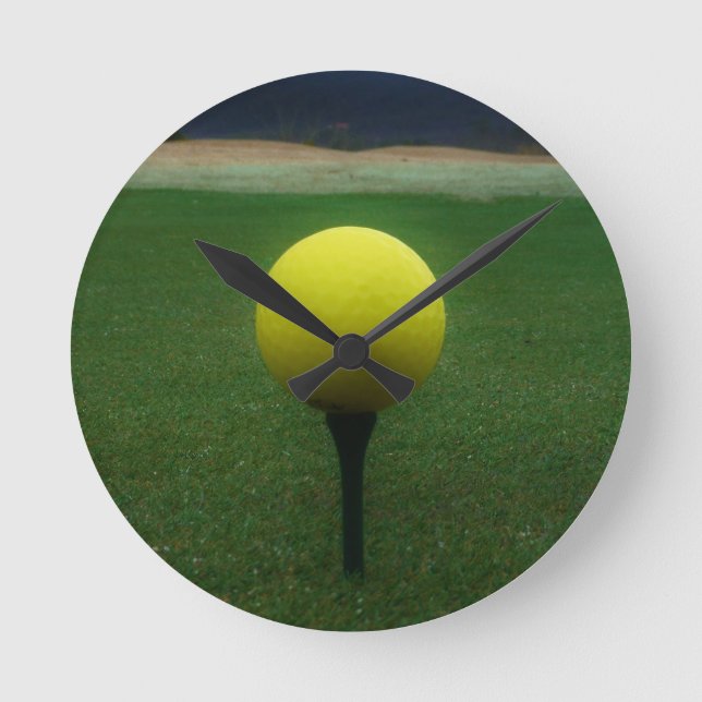 Yellow Golf Ball on a mountain golf course Round Clock (Front)