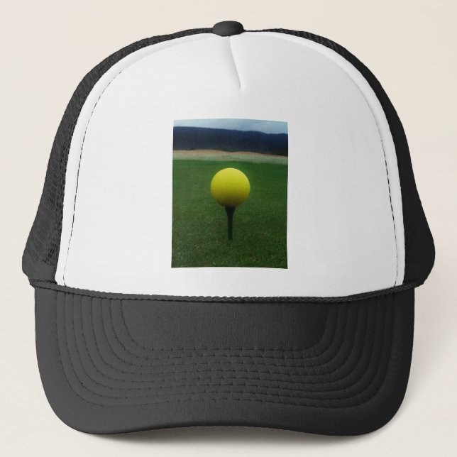 Yellow Golf Ball on a mountain golf course Trucker Hat (Front)