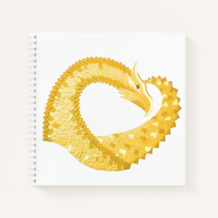 Yellow heart dragon on white notebook