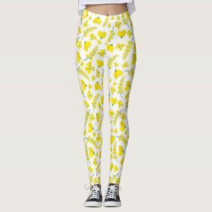 Yellow heart-shaped floral print on white leggings