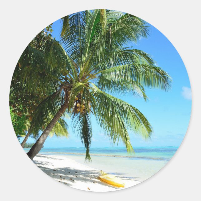 Yellow kayak on a white sand beach round sticker (Front)