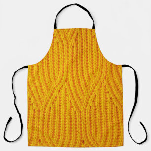 Yellow knitted surface textile material background apron