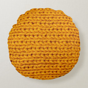 Yellow knitted wool texture background pattern wit round cushion