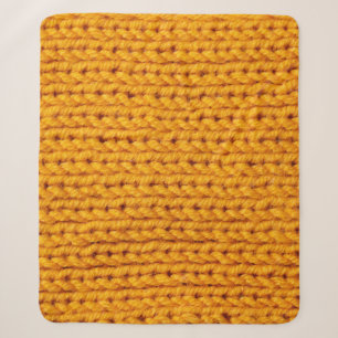 Yellow knitted wool texture background pattern wit sherpa blanket