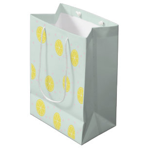 Yellow lemon slices on  blue medium gift bag