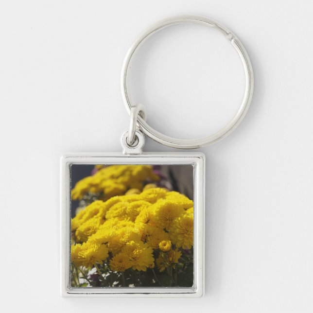 Yellow marigolds bask in sunlight key ring (Front)