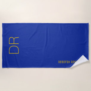 yellow name + initials on a cobalt blue elegant beach towel