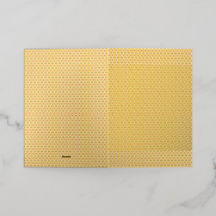 Yellow, orange, and brown sheets of wrapping paper foil greeting card