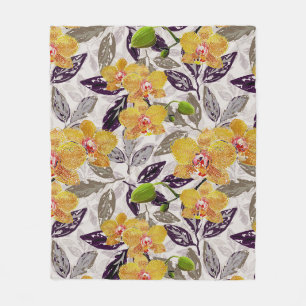 Yellow orange orchids. fleece blanket