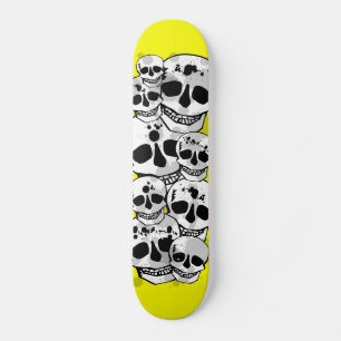 Yellow paint splatter skulls black skateboard deck
