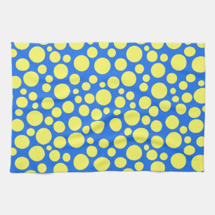 Yellow peas on a sky blue background tea towel
