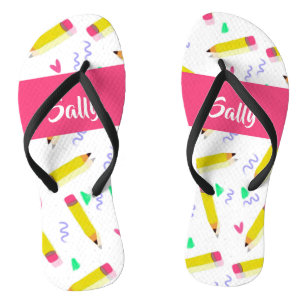 Yellow pencils and scrabbles on white flip flops