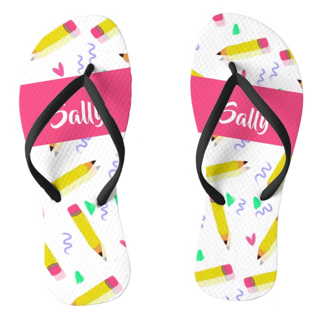 Yellow pencils and scrabbles on white flip flops (Footbed)