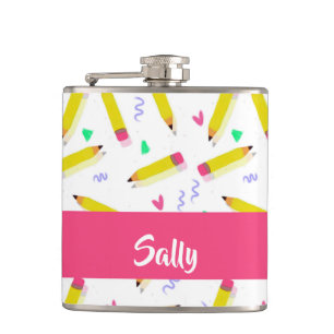 Yellow pencils and scrabbles on white hip flask