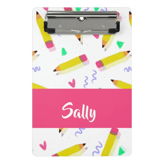 Yellow pencils and scrabbles on white mini clipboard (Front)