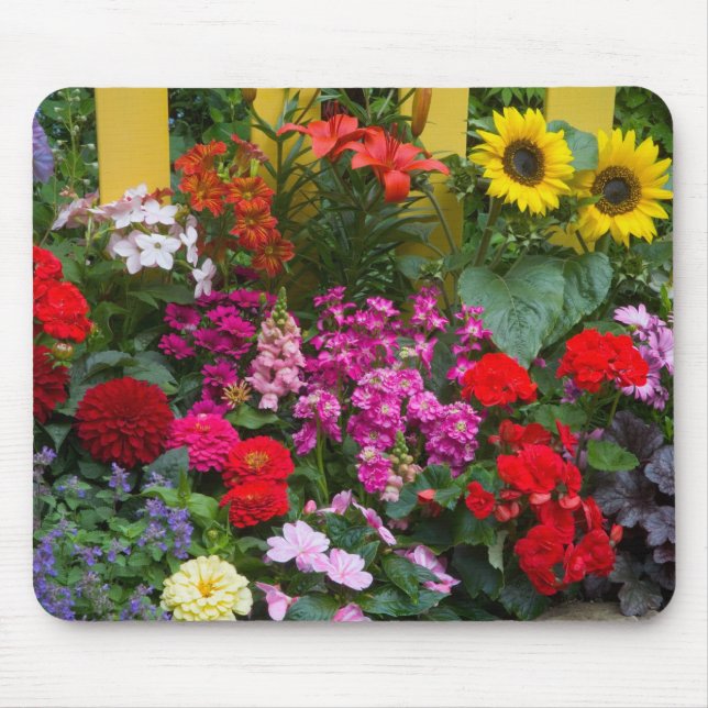 Yellow picket fence with flower garden in mouse mat (Front)