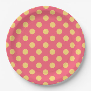 Yellow polka dots on coral paper plate