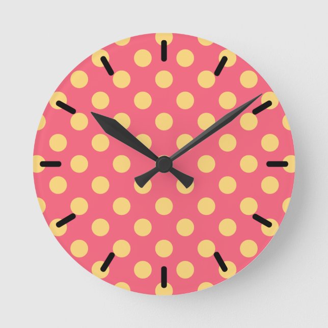 Yellow polka dots on coral round clock (Front)