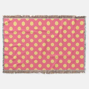 Yellow polka dots on coral throw blanket