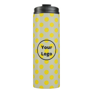 Yellow polka dots on tan thermal tumbler