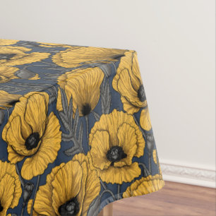 Yellow poppies on navy tablecloth