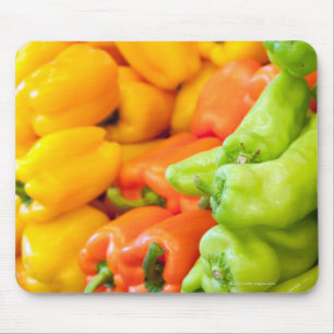 Yellow, red and green pepper on sale at farmer's mouse mat