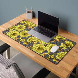 Yellow roses with grey leaves on orange desk mat