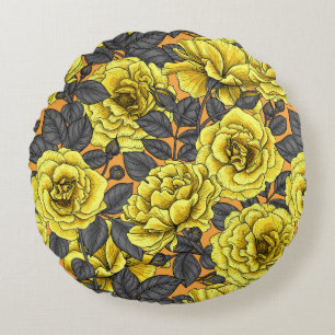 Yellow roses with grey leaves on orange round cushion