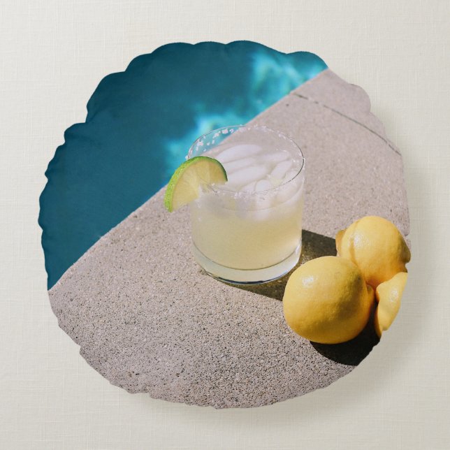 Yellow round fruits on grey table cushion (Front)
