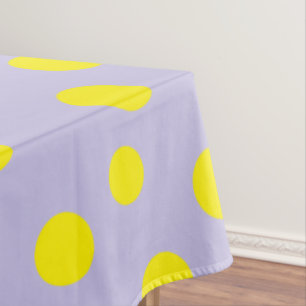 Yellow round polka dots on grey tablecloth